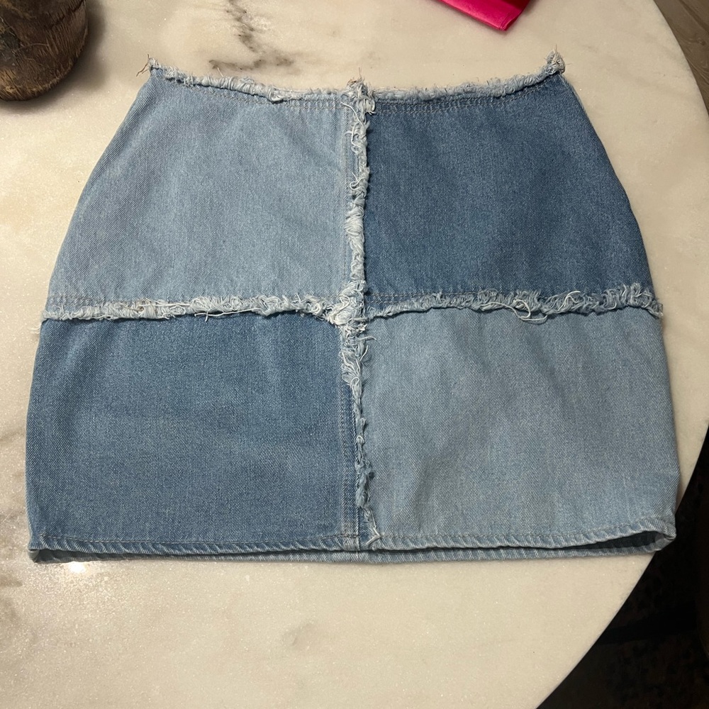 Jean skirt from briny boutique…never worn! Zips up back!